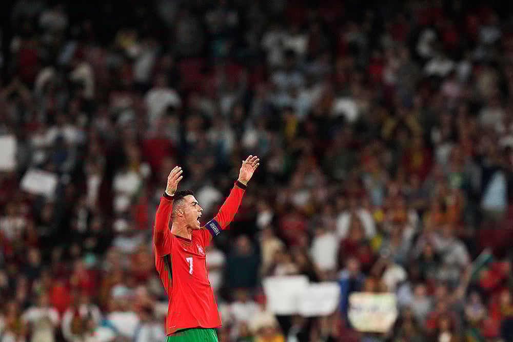 | Photo: AP/Armando Franca : 2024–25 UEFA Nations League, Portugal vs Scotland: Portugal's Cristiano Ronaldo celebrates after match against Scotland